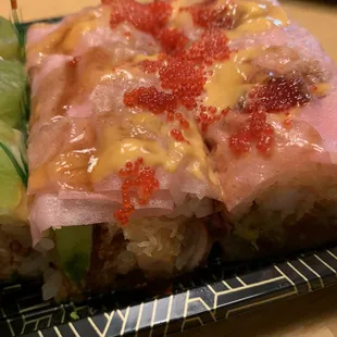 a piece of sushi on a plate