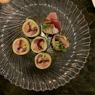 a plate of sushi on a table