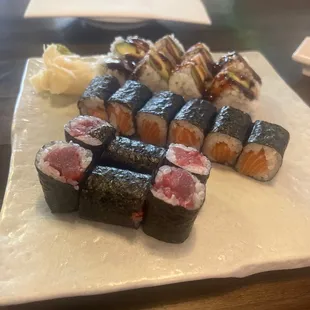 Tuna roll, salmon roll, and eel avocado roll