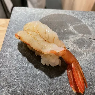 a close up of a piece of sushi
