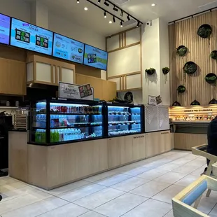 Counter with ready to eat sushi and salad