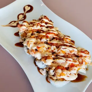 Baked lobster roll
 Inside: crab, avocado 
 Outside: (baked) lobster mix, eel sauce, and spicy mayo