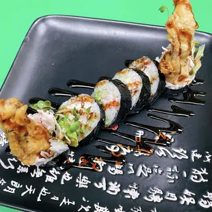 Spider roll
 Inside: soft shell crab, avocado, crab, cucumber, kaiware
 Outside: (deep fried) eel sauce