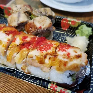 Lion king and CA roll with unagi on top