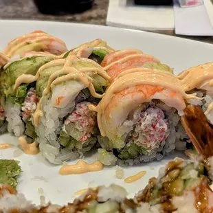 A close-up of the 007, crab salad topped with cooked shrimp and sliced avocado. Nice but smaller than the other rolls available here.