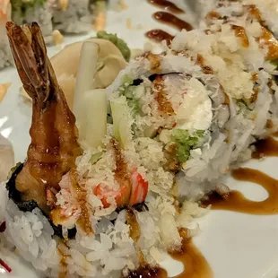 A close-up of the Number One, shrimp tempura with cream cheese, avocado, and crab stick.