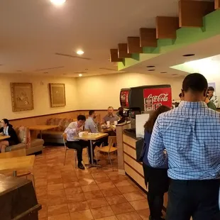 a group of people in a restaurant