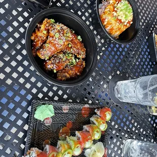 Tuna stack, wings, their spicy sushi roll