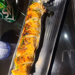 Baked salmon roll and a dragon roll