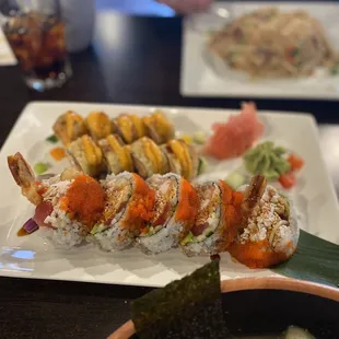 a plate of sushi on a table