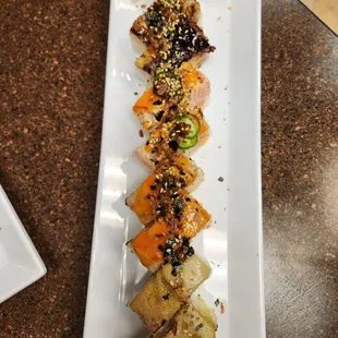 Torch sushi - spicy tuna, unagi, spicy salmon, and  wasabi tuna