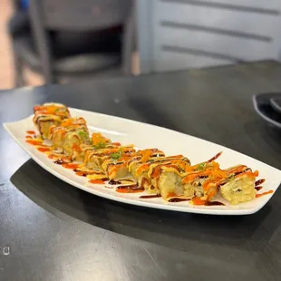 a plate of sushi on a table
