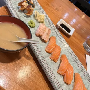 Eel, Seared salmon nigiri, and salmon nigiri. The miso is so tasty here and piping hot every time