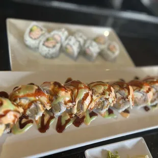 Temptation Roll  Shrimp tempura, crab, cream cheese, topped with crab and 4 season sauce
