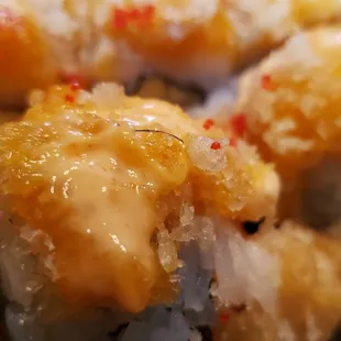 a close up of a plate of sushi