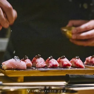 a chef preparing sushi