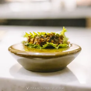 a bowl of food on a counter