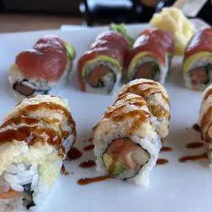 a plate of sushi rolls