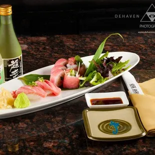 Toro (fatty tuna) nigiri and Toro roll Inside roll: Toro, cucumber, cilantro, fresh jalapeno, wrapped in soy paper (pink).