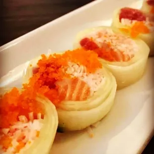 a row of sliced onions on a white plate