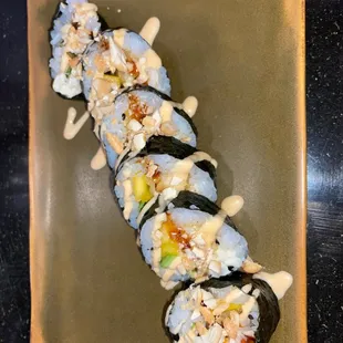 a plate of sushi on a table