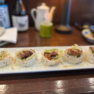  a plate of sushi rolls