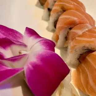 a close up of a plate of sushi