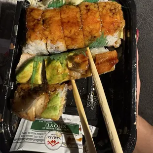 A picture of the food I received -2 pieces of the 1st sushi roll as you can tell clearly.