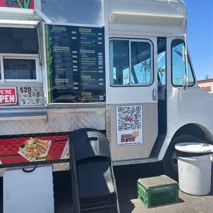 a food truck parked in a parking lot