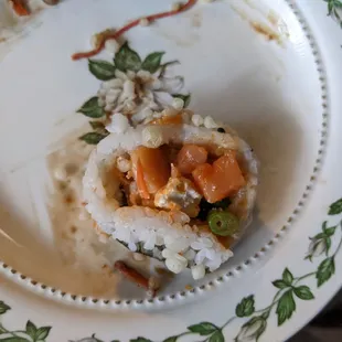 2 tiny chunks of fish with more cream cheese than anything else.