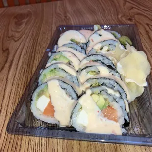 Create Your 1/ Create Your Own Roll - SEAWEED Wrap : salmon (raw), avocado, cream cheese topped with Yum Yum sauce