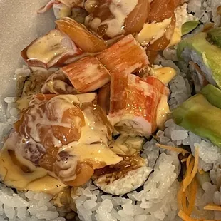 a variety of sushi and vegetables