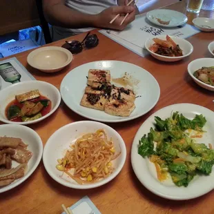 Complimentary banchans(side dishes), typical in most Korean Sushi restaurants. However, the grilled tofu is fresh &amp; hot!