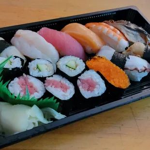 a tray of different types of sushi