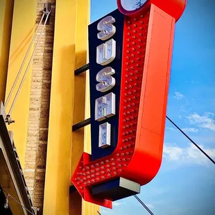 a neon sign on a building