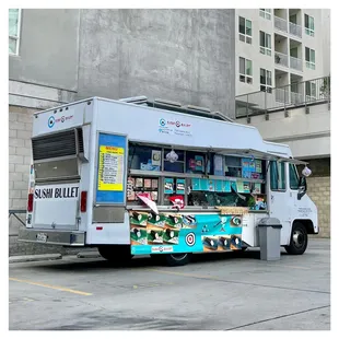 a food truck parked in a parking lot