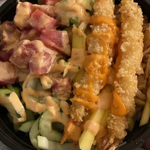tuna and shrimp tempura with edamame, cucumber, mango, scallion, crispy onion, avocado and cream cheese. Add poke sauce and spicy Mayo.