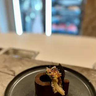 a sushi on a plate