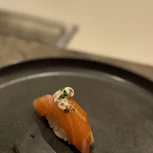 a sushi on a plate