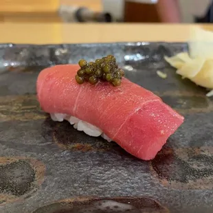 a sushi on a plate