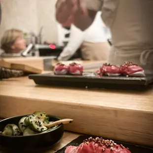  a chef preparing sushi