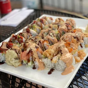 a plate of sushi on a table