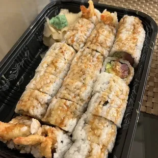 a tray of sushi rolls