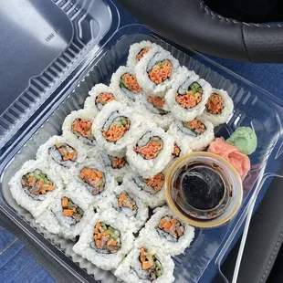 Spicy crab roll (2 orders, right side), salmon roll (left side)