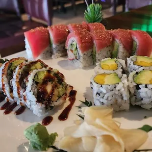 Red Dragon Roll, Mango Avocado Roll, and Shrimp Tempura Roll during happy hour.