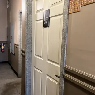 Door to women&apos;s restroom