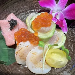 Special meal: lightly seared scallops, Kampachi topped with ikura, and Toro adorned with caviar. It was heavenly.