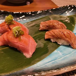 Left - O toro nigiri  Right - A5 wagyu nigiri