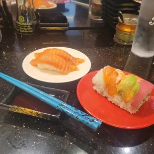 10/3/2023 - Salmon nigiri and a rainbow roll.