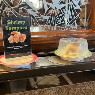 two plates of food on a counter